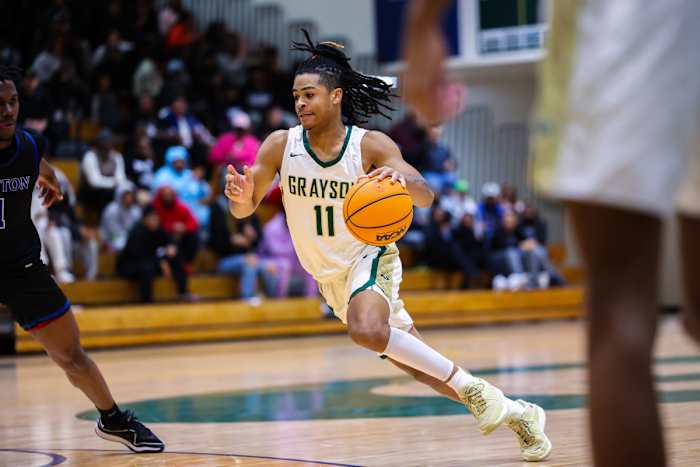 Grayson senior guard CJ Hyland drives to the basket during Tuesday night's 76-70 win over Newton. (Photo: Colin Hubbard)